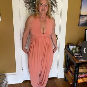 EUC Free People No Contest Jumpsuit Size L in a pretty peach color